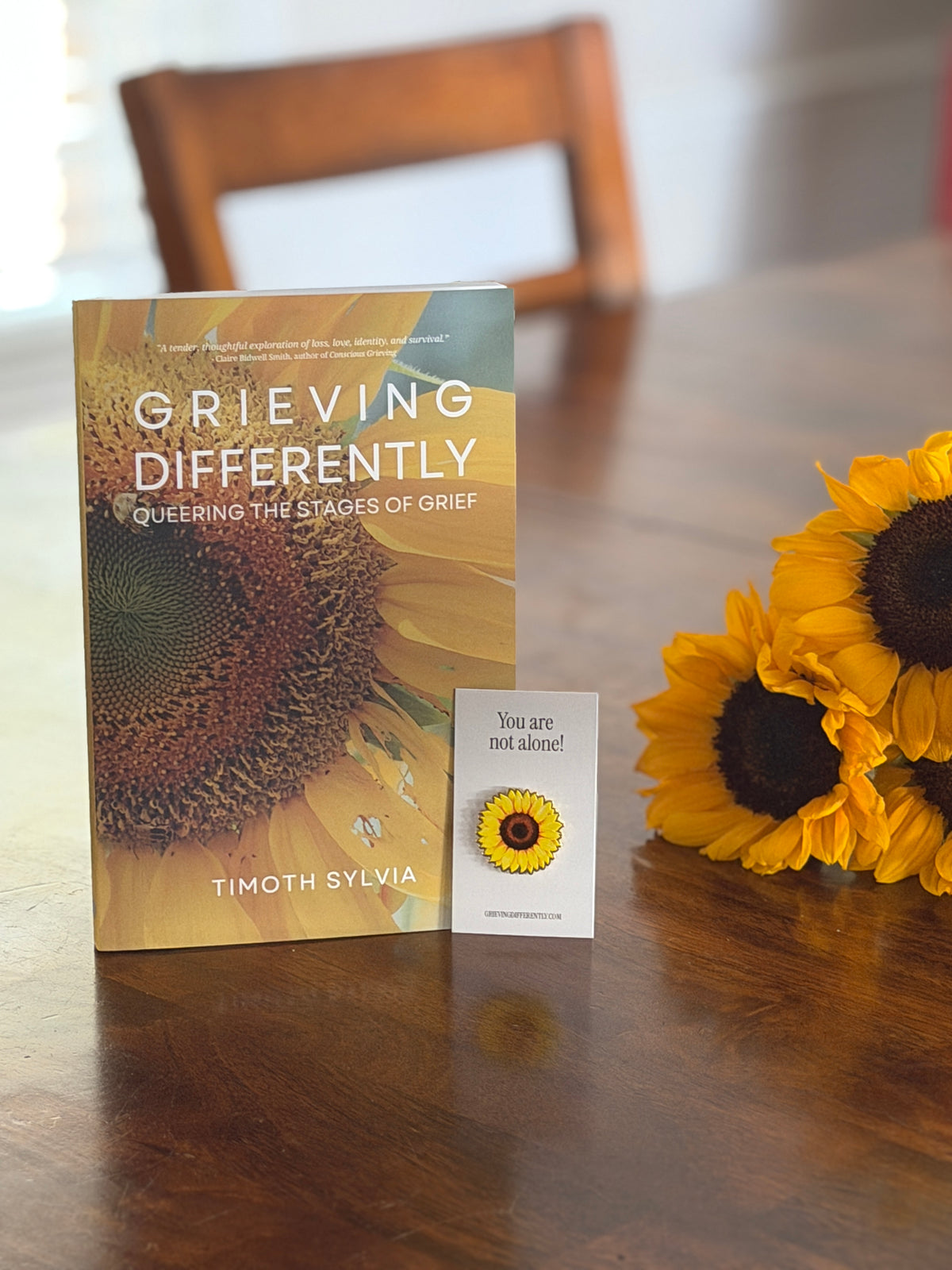 PRE-ORDER: Signed Copy - Grieving Differently: Queering the Stages of Grief + Sunflower Enamel Pin